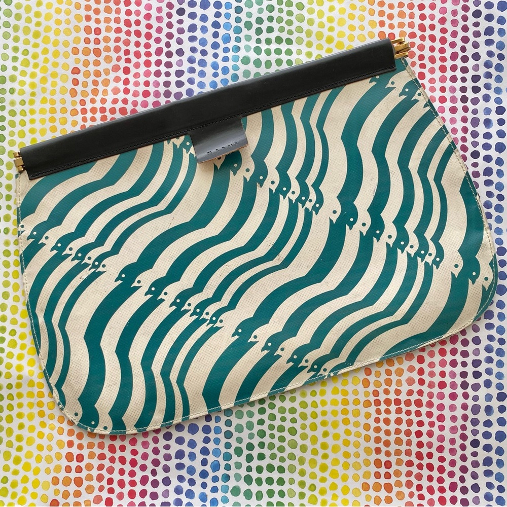 Marni rare XL clutch with a bold green abstract bird pattern.